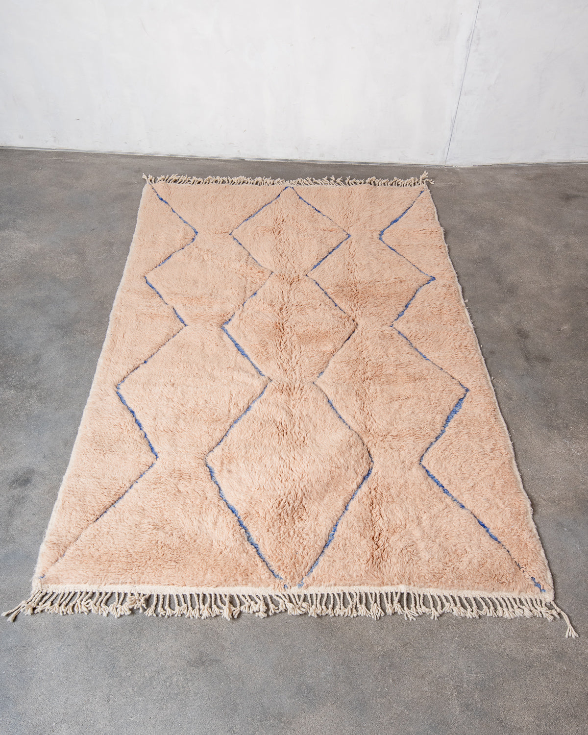 Modern, designer, handcrafted Berber rug from Morocco. Beniourain carpet with beautiful colours and patterns and fluffy wool texture.
